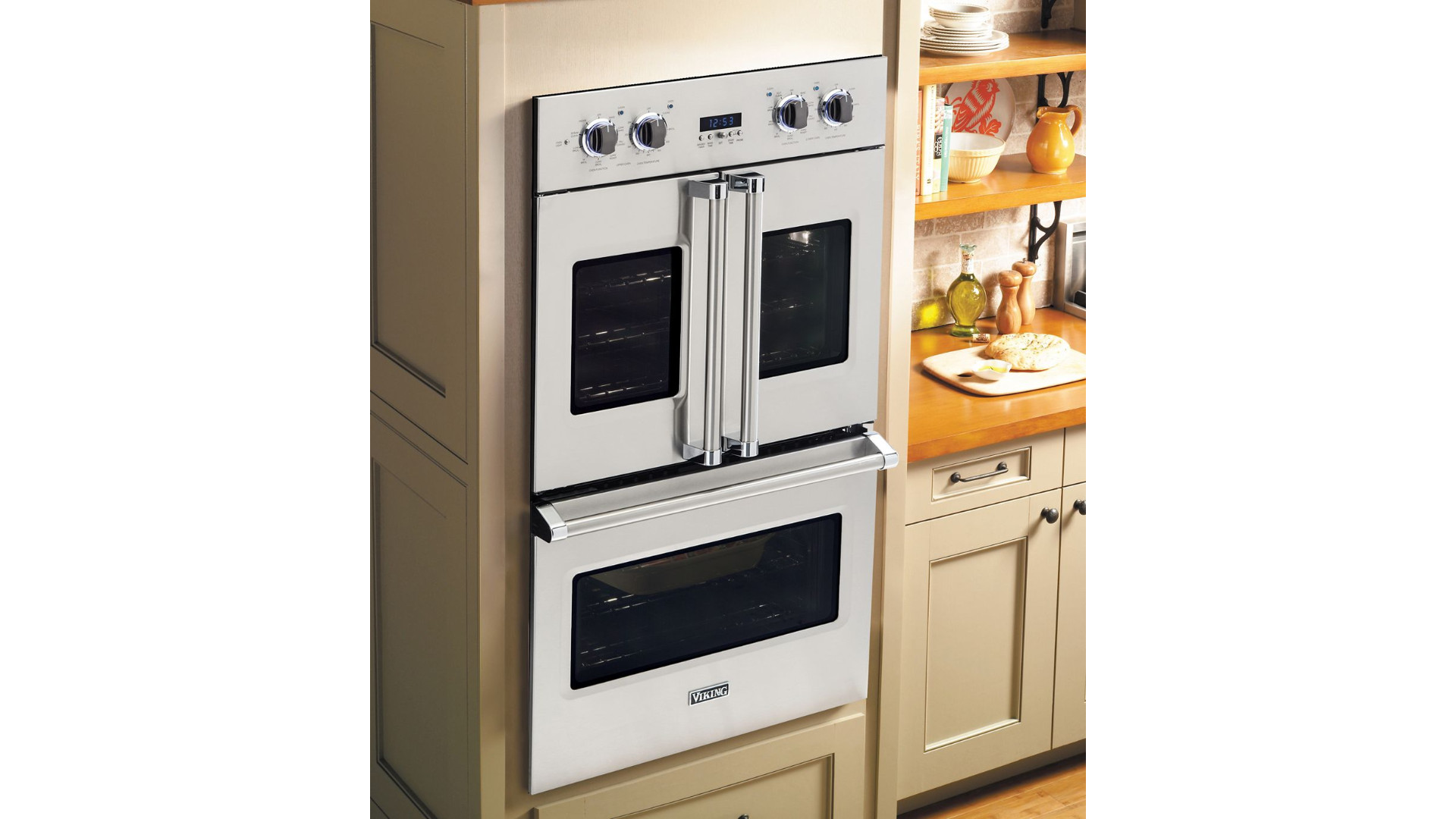 Built-in Viking Professional stainless steel wall oven cleanly integrated into luxury custom cabinetry
