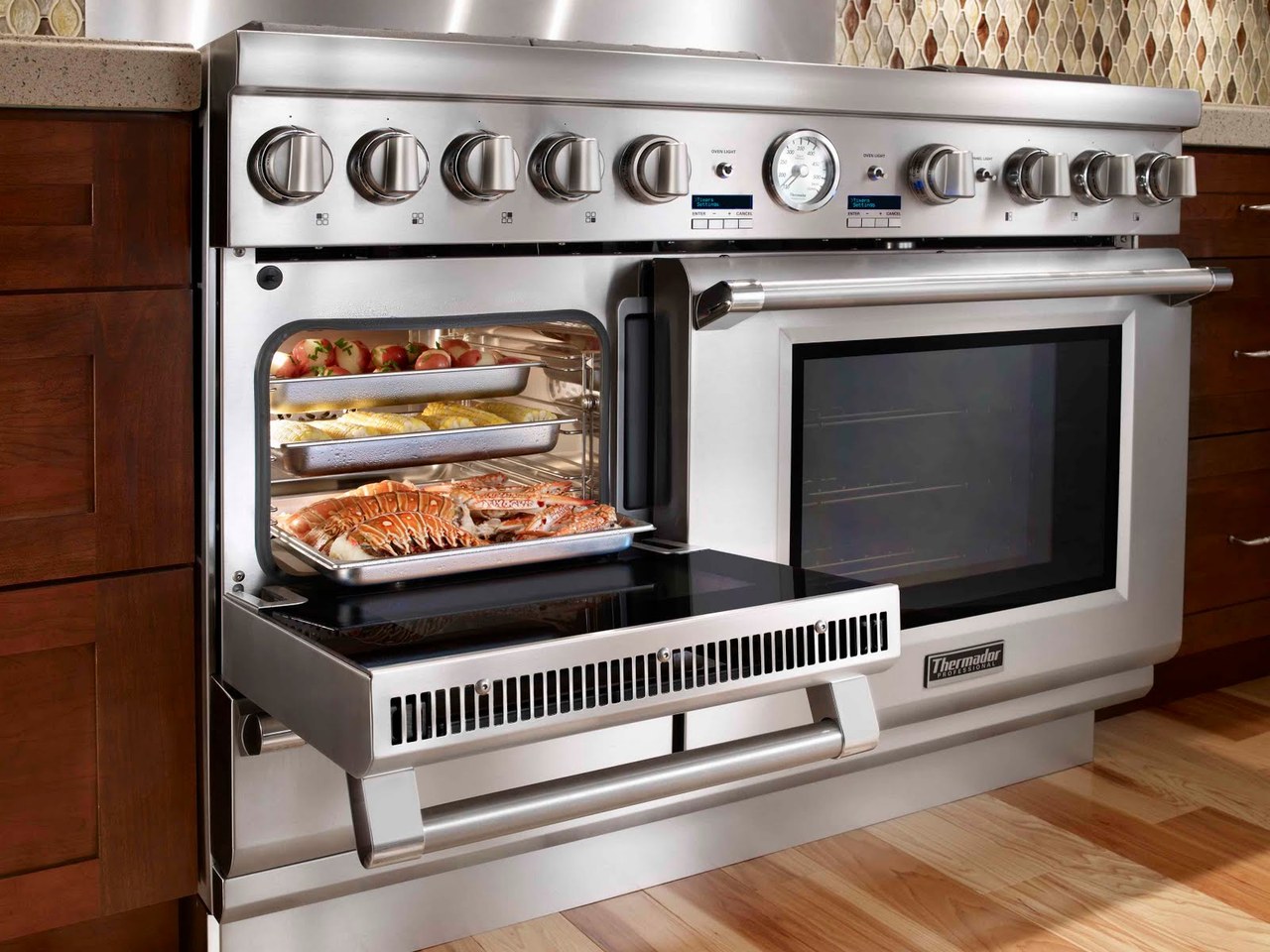 Built-in Thermador Masterpiece double wall oven flush mounted in custom cabinetry